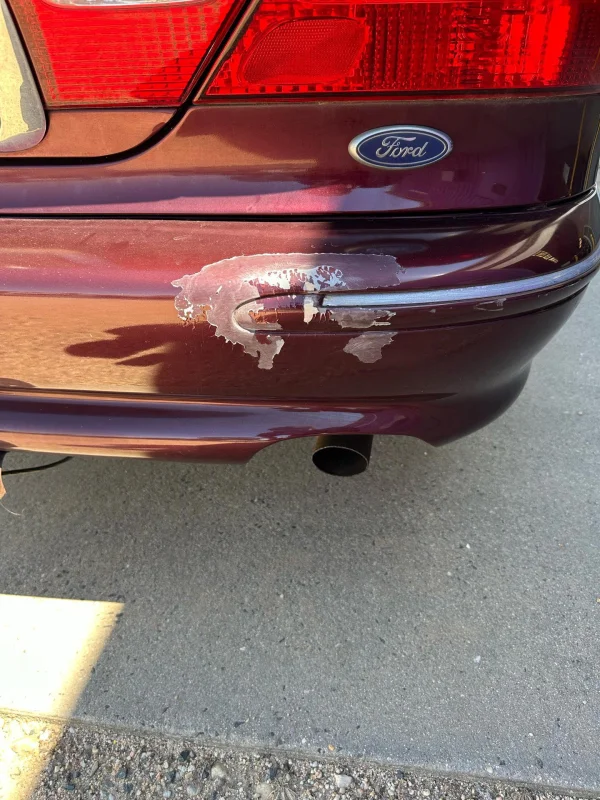 Ford Fairmont before repair - damaged bumper